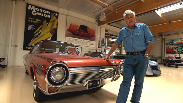 Jay Leno Car Collection featuring Jay Leno with the Chrysler Turbine Car inside his legendary garage.
