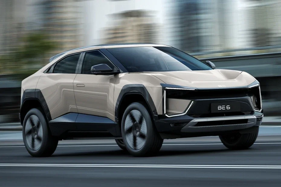 Mahindra BE 6 electric SUV driving on a city road