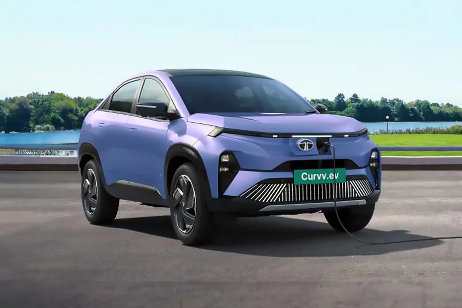 Tata Curvv EV electric SUV parked near a lakeside