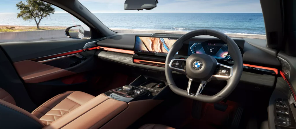 BMW i5 LWB dashboard with digital instrument cluster and central display