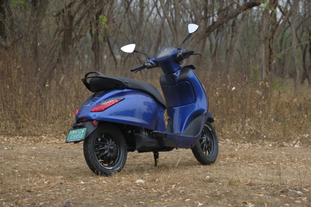 Blue Bajaj Chetak electric scooter showing its body design and rear styling